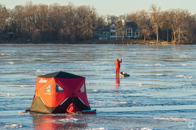 A fisherman on the ice at nearby Gray's Bay.