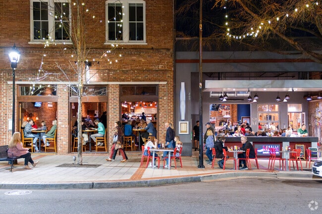 People enjoy dining at various restaurants in downtown Greenville.