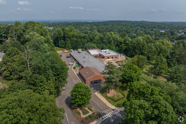 Mountain Way Elementary School has a campus surrounded by forest.