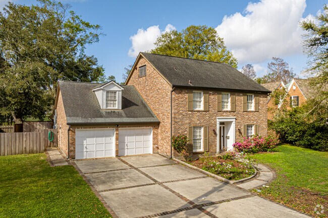 Federal-style homes in Timberlane offer timeless designs and practical features, like a two-car garage.
