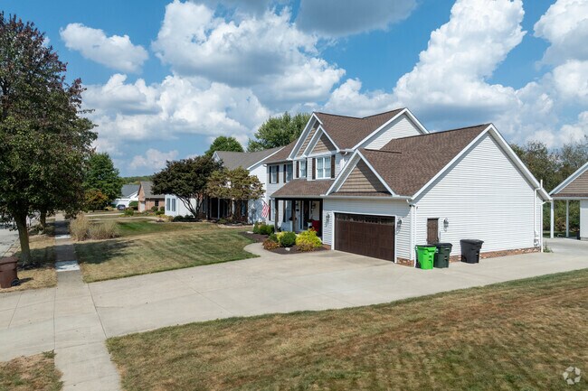 In Doylestown, a development features streets lined with Modern Colonial Revival homes, lending the neighborhood a timeless charm.
