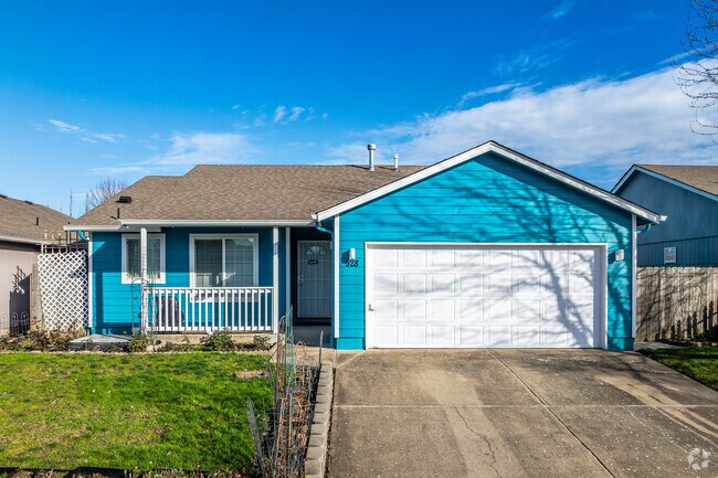 This ranch-style home has a 2-car garage and composite roof in Southeast Mill Creek.