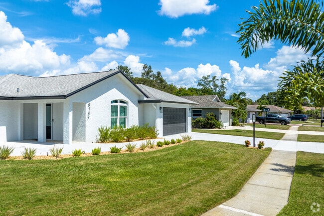 Ranch-style homes are common along Sarasota Springs’ quiet, shaded streets.