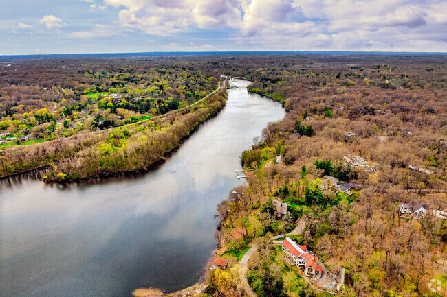 The Barton Hills neighborhood of Ann Arbor is a wooded community set along the Huron River.