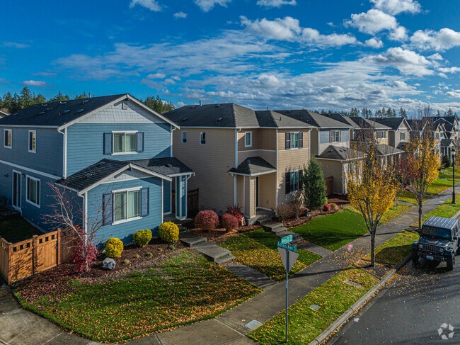 Beautiful contemporry homes on a Hawks Prairie sunny street.