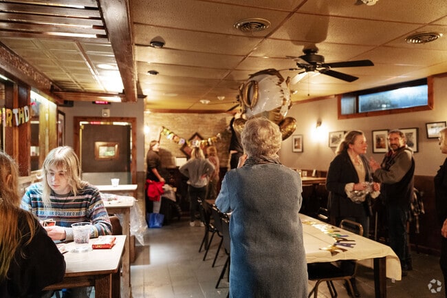 Come have a drink with friends at the 214 Tap Room, located near Hudson Park.