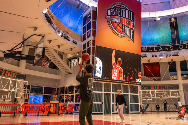A boy shoots at The Naismith Memorial Basketball Hall of Fame in Springfield.