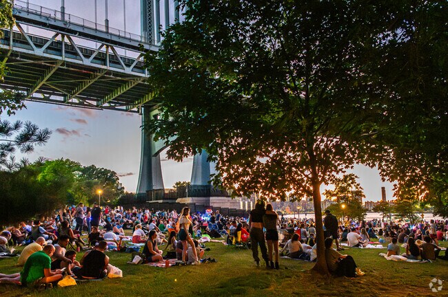 People gather in groups and enjoy the firework on Independence Day Celebration.