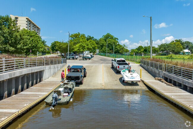 Residents from The Bottom access the Cape Fear River via the Dram Tree Park boat launch.