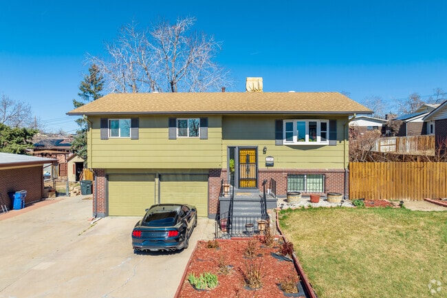 Most homes in Sherrelwood feature front lawns and two car garages.