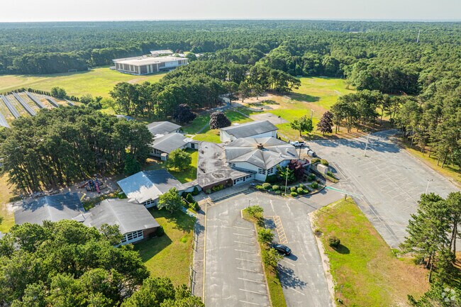 Marguerite E. Small Elementary School sits on several acres of open fields with plenty of shade.