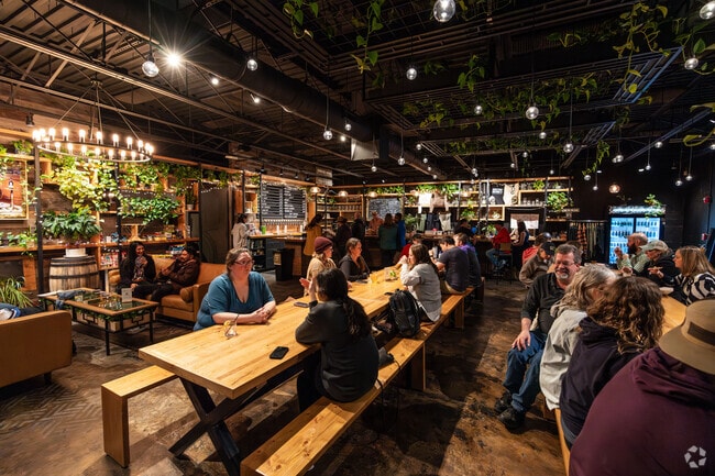 Locals enjoy grabbing drinks with friends at The Greenhouse in the Arts District.