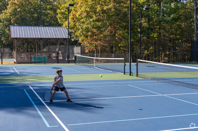 Lakeshore also features amenities like tennis courts for residents.