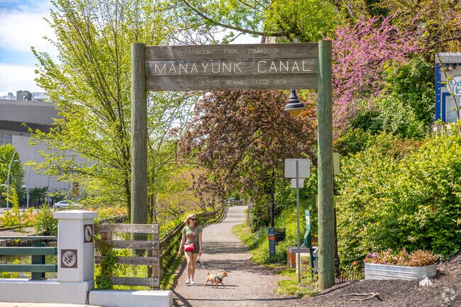 Walk the dog on the Schuylkill River Trail along the Manayunk Canal.