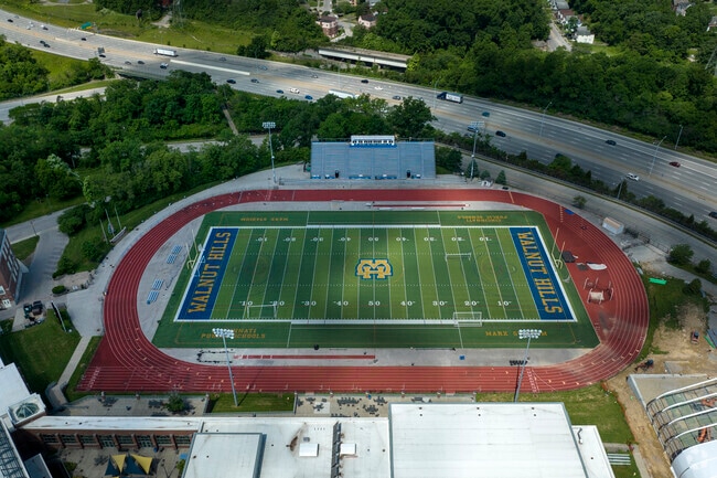 The Football field is located behind  Walnut Hills High School.