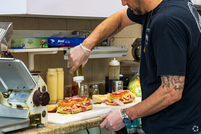 Order a handcrafted Italian sandwich amongst other fresh menu items prepared at Agaime Deli.