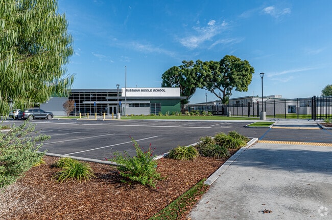 The parking and front entrance to Sussman Middle School