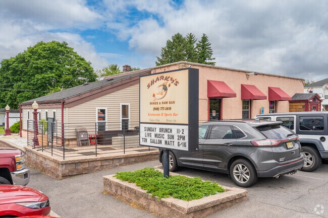 Sharky’s Wings & Raw Bar near Alpha often draws a crowd, with its parking lot frequently full thanks to its popular menu and lively atmosphere.