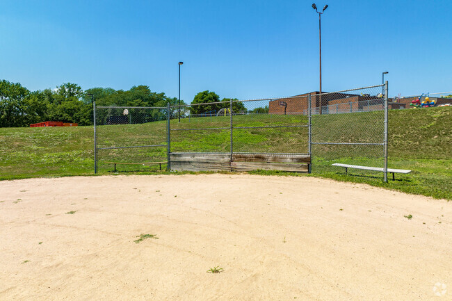 Behind the school is a baseball field for athletics and PE.