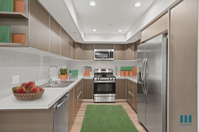 Full-Size Kitchen with Stainless-Steel Appliances and Ample Cabinet Storage