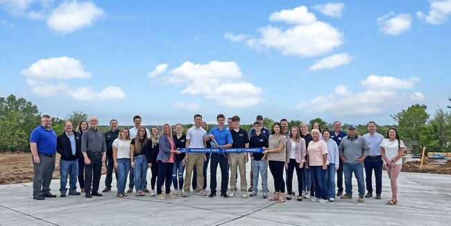 Stone Bridge Ribbon Cutting with WSD CAPS.jpg