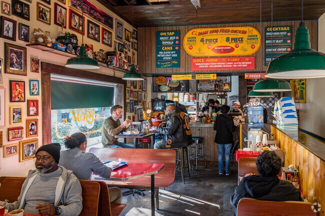 Residents have many dining options nearby in Decatur square, like Mother's Best Fried Chicken.