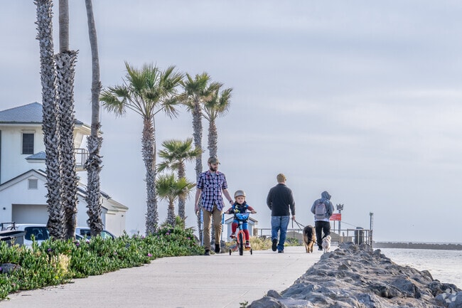 Locals love walking the path along the Channel Islands Harbor inlet.