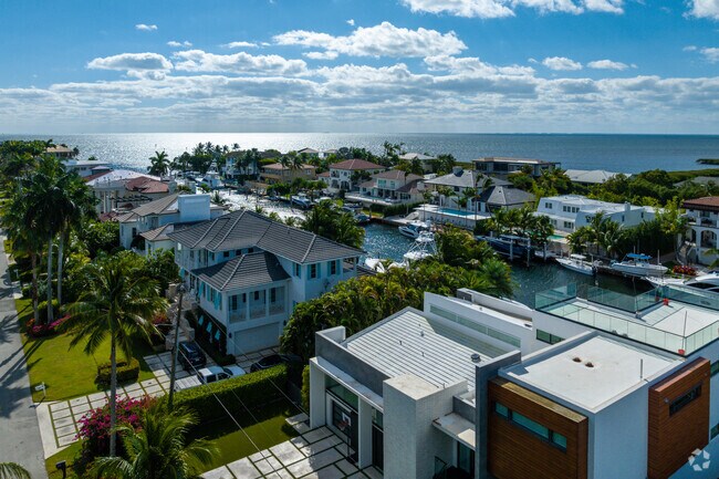 Homes line the tranquil canals of Gables By The Sea in Coral Gables.