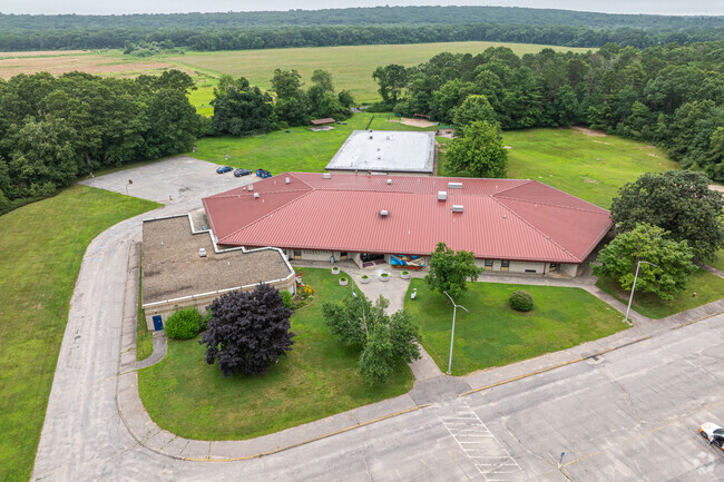 West Kingston Elementary School sits on several acres of open fields and forrests.