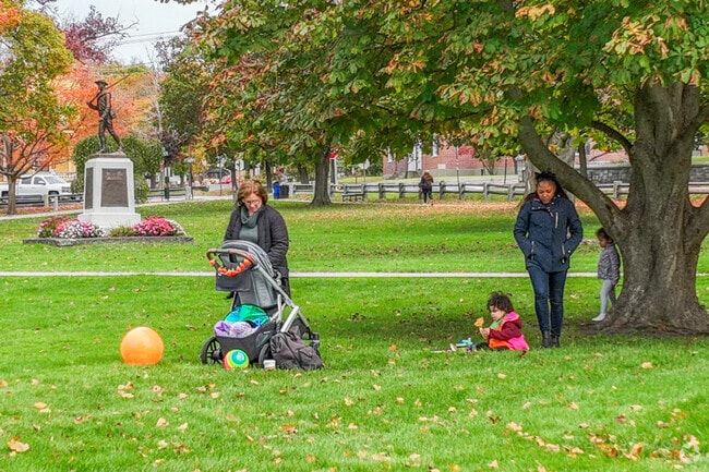 Kids love the lush green grass at Central Park in Lancaster.
