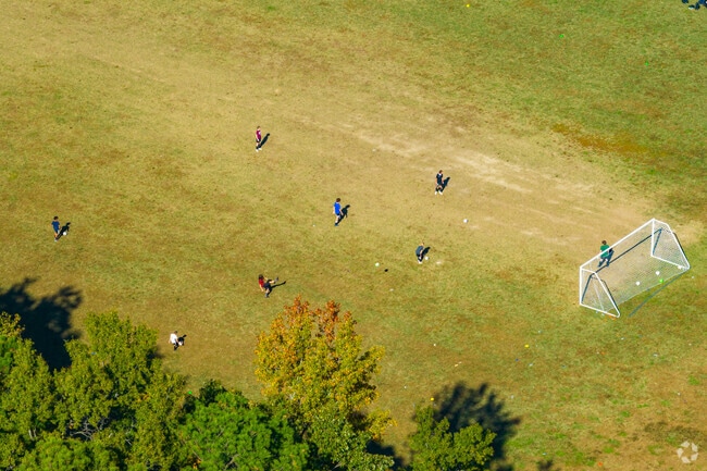 Students in Pocoshock enjoy kicking a soccer ball and scoring a point for their home team.
