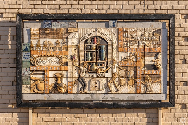 A sculpted mural hints at the artistic influences found throughout Blendville North.