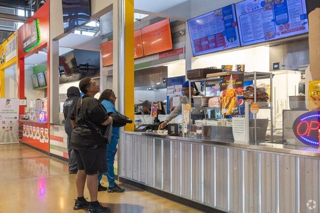 Snag some tasty lunch from one of the many restaurants at the AMP food hall in Riverside.