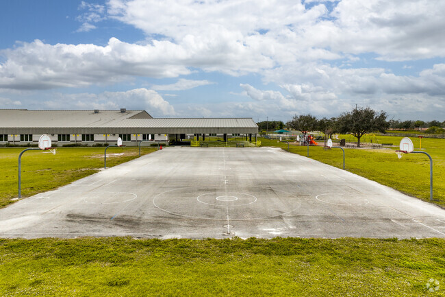 The large open basketball courts allow students ample space to play.