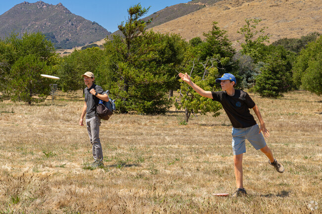 Two Madonna residents spend their afternoon at the nearby Laguna Lake disc golf course.