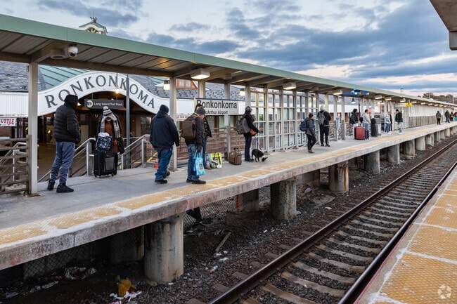 The train from Ronkonkoma will have you from Holbrook to the city in about an hour.