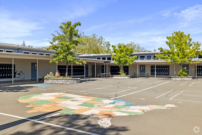 Larkspurs AE Kent Middle School students can play games on the black top with classmates.