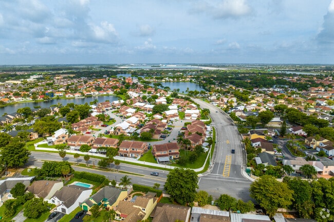 Aerial overview of Country Club and its many homes with terracotta roofs.