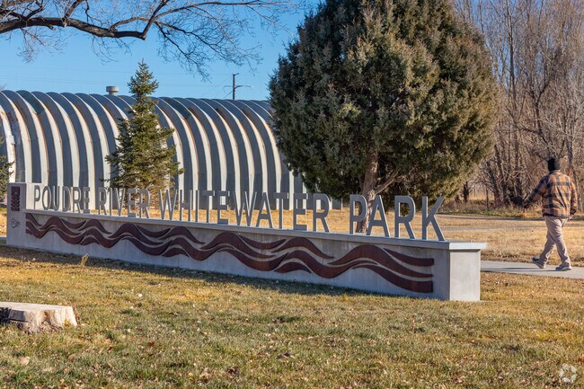 Poudre River Whitewater Park offers kayaking, tubing, and scenic riverside trails.