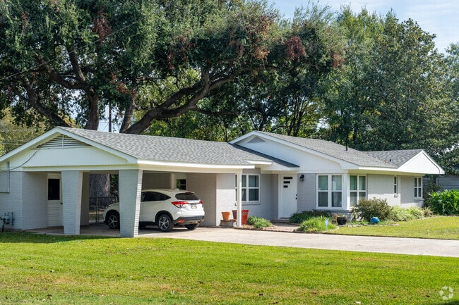 Many midcentury ranch-style homes in Mimosa Place have attached carports.