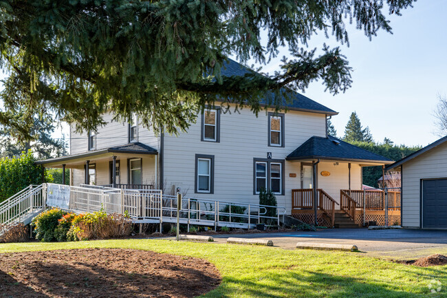 The parking lot and covered side entrance.