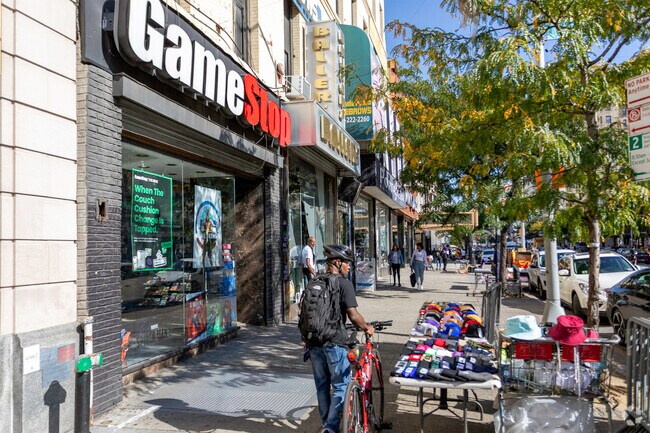 Locals visiting the vendors in the Astor Row neighborhood.