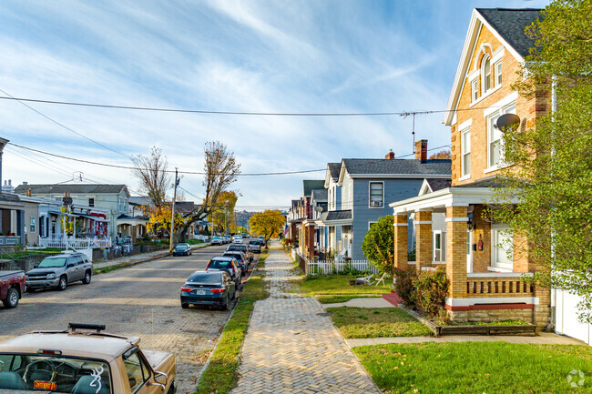 Many residential streets offer sidewalks for pedestrians to use.