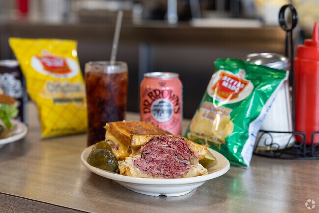 Grab lunch at Hygrade Deli near Core City.