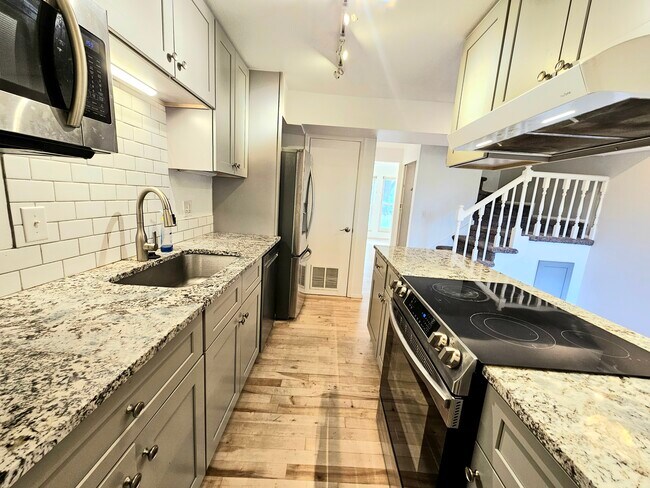 Kitchen, looking through to living room