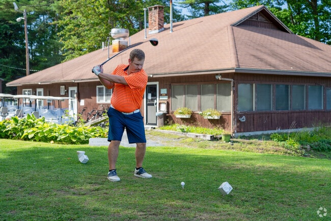 A golfer tees off at the Claremont Country Club in the Maple Avenue District.