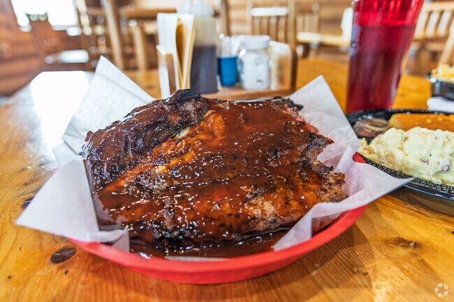 Try the slow cooked, hickory smoked beef ribs at Bird's Smokehouse BBQ.