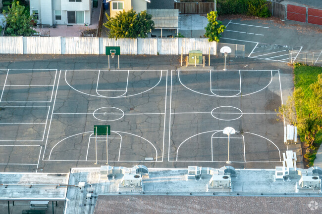 Have a round of basketball at Robertson High (Continuation) School.