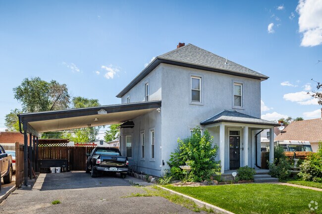 A two-story home with a car port and well-manicured lawn is seen in Bessemer.