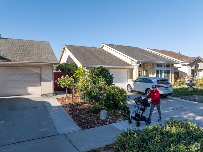 Meadows streets offer a serene walk for mother and child.